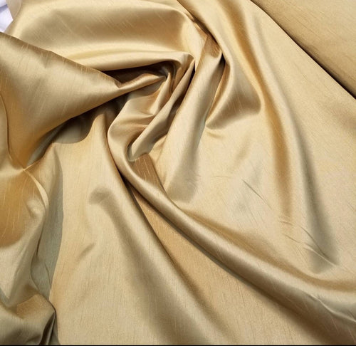 Poly gold shantung 108" wide      Beautiful gold color   Fabric sold by the fabric