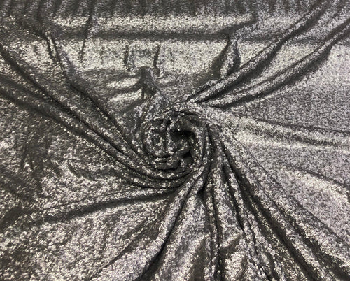 Solid sequins on mesh fabric 52" wide   Top of the line quality  beautiful grey color sequins on mesh fabric sold by the yard