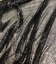 Black sequins on swirl meah fabric 52&quot; wide   Fabric sold by the yard
