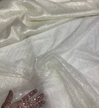 Ivory sequins on swirl mesh fabric 52&quot; wide    Fabric sold by the yard