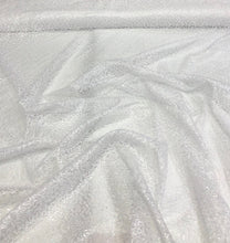 White sequins on sheer swirl mesh 52&quot; wide    Sequins fabric sold by the yard