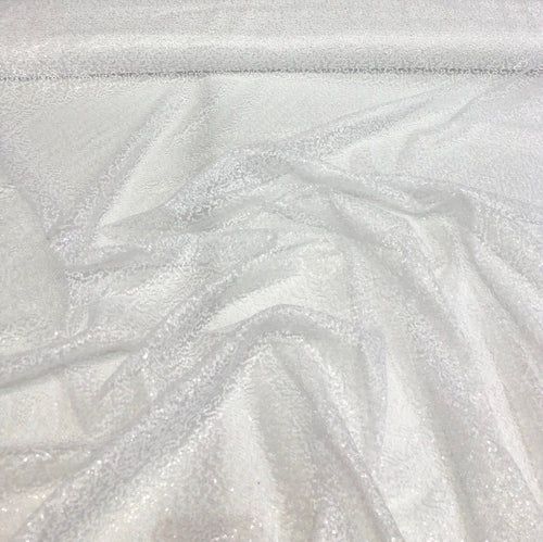 White sequins on sheer swirl mesh 52" wide    Sequins fabric sold by the yard