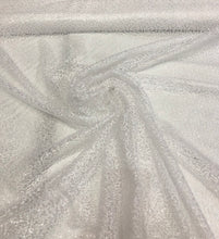 White sequins on sheer swirl mesh 52&quot; wide    Sequins fabric sold by the yard