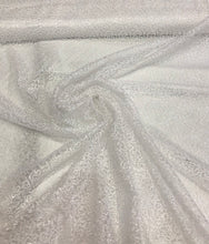 White sequins on sheer swirl mesh 52&quot; wide    Sequins fabric sold by the yard