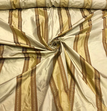 Silk taffeta stripes jaquard 54&quot; wide    Beautiful gold & mustard stripes taffeta jaquard fabric sold by the yard