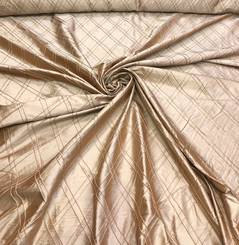 Silk shantung pintuck 52" wide    Beautiful champagne color silk shantung pintuck fabric sold by the yard