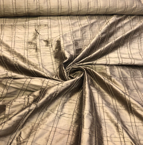 Silk shantung pintuck 52" wide   Beautiful bronze color silk shantung fabric sold by the yard