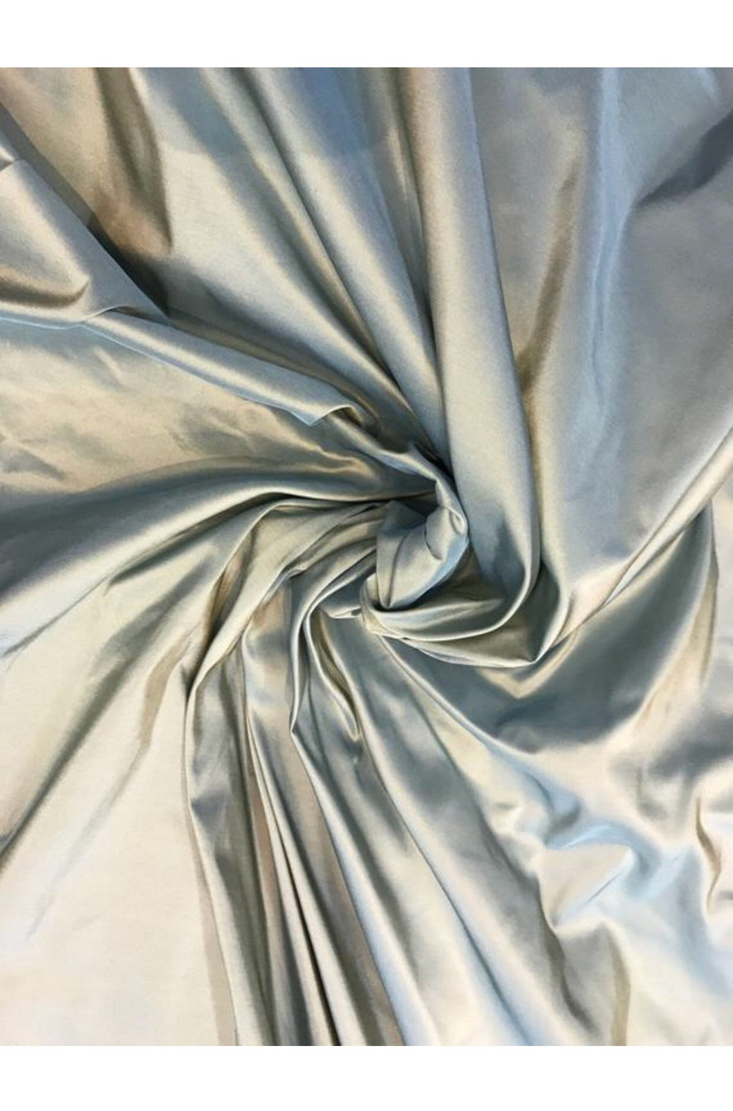 Silk taffeta 54" wide    Beautiful iridescent mint green color silk taffeta fabric sold by the yard