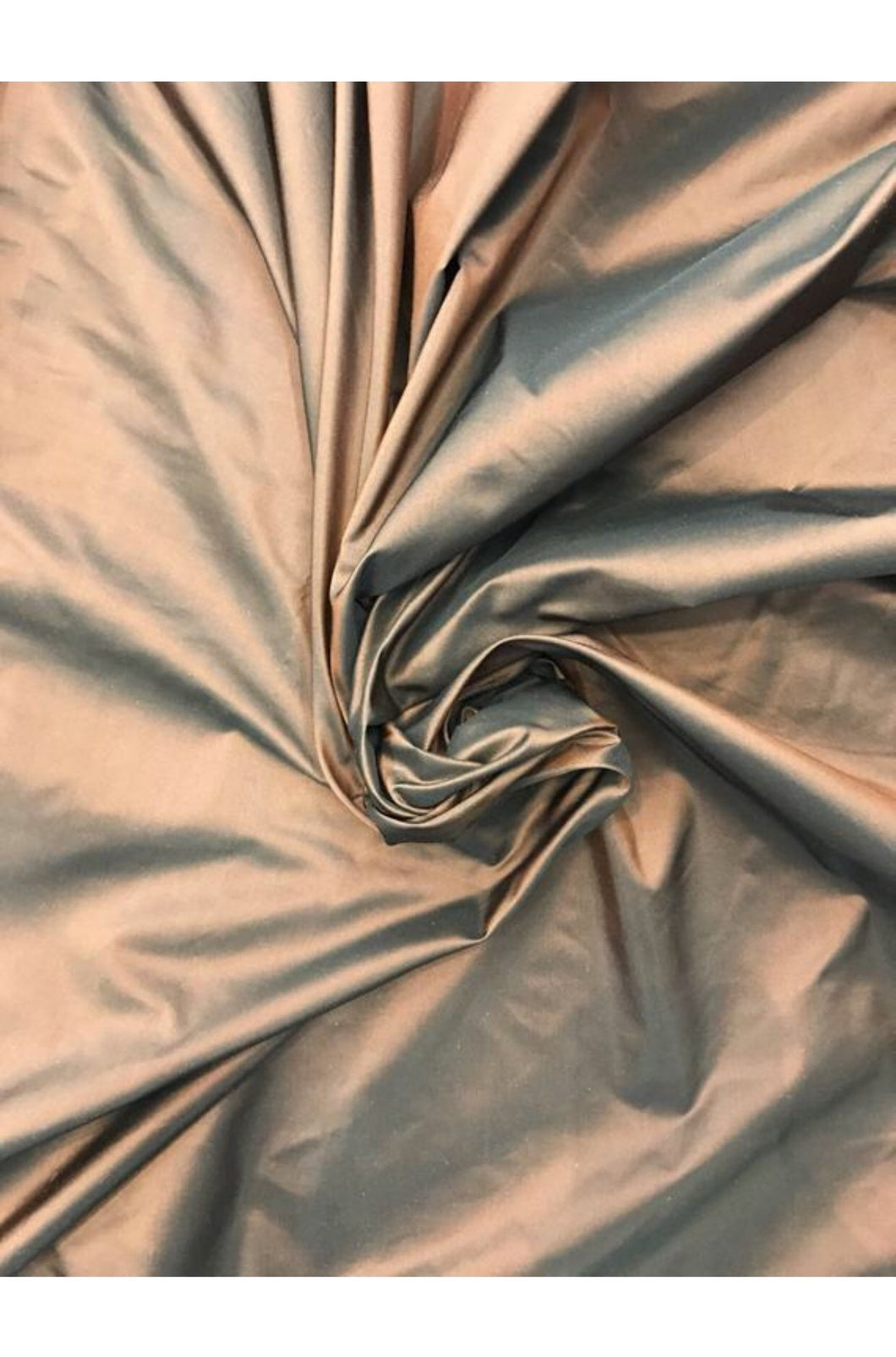 Silk taffeta 54" wide     Beautiful iridescent copper color silk taffeta fabric sold by the yard