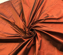 Silk taffeta 54&quot; wide    Beautiful burnt orange color silk taffeta fabric sold by the yard