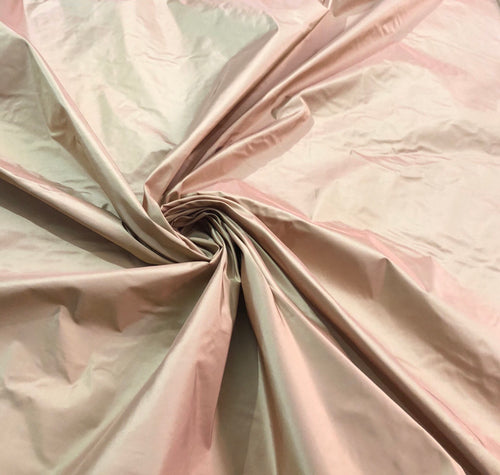 Silk taffeta 54" wide    Beautiful peach gold color silk taffeta fabric sold by the yard