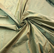 Silk taffeta 54&quot; wide    Beautiful iridescent green gold silk taffeta fabric sold by the yard