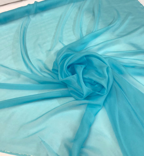 Silk chiffon 54" wide    Beautiful aqua blue color silk french chiffon fabric sold by the yard