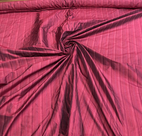 Silk shantung pinstripes 54" wide   Beautiful fusia puple color silk shantung fabric sold by the yard