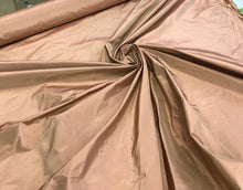Silk taffeta 54&quot; wide    Beautiful light pumpkin gold color silk taffeta, you can also call it rose gold fabric sold by the yard