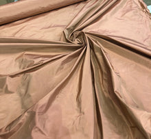 Silk taffeta 54&quot; wide    Beautiful light pumpkin gold color silk taffeta, you can also call it rose gold fabric sold by the yard