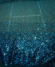 Sequin on tule 58&quot; wide   Beautiful turquise color border style sequin fabric sold by the yard