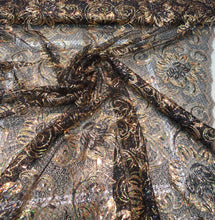Allover floral pattern sequins 56&quot; wide   Beautiful black & gold floral pattern sequins fabric sold by the yard