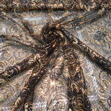 Allover floral pattern sequins 56&quot; wide   Beautiful black & gold floral pattern sequins fabric sold by the yard