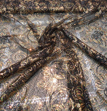 Allover floral pattern sequins 56&quot; wide   Beautiful black & gold floral pattern sequins fabric sold by the yard