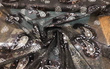 Sequins allover paisley design 54&quot; wide   Beautiful black on black paisley design sequins on net fabric sold by the yard