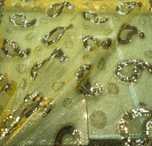 Sequins allover paisley design 54&quot; wide   Beautiful gold paisley design sequins on net fabric sold by the yard