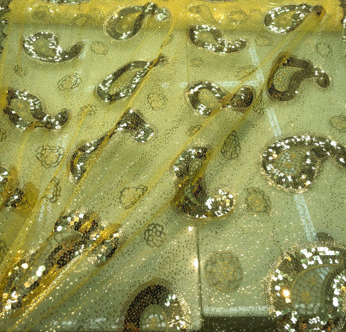 Sequins allover paisley design 54" wide   Beautiful gold paisley design sequins on net fabric sold by the yard