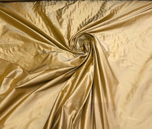 Silk taffeta 54&quot; wide     Beautiful iridescent antique gold color ailk taffeta fabric sold by the yard