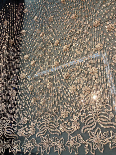 Floral abstract design sequins embroidered on mesh fabric sold by the yard