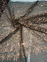 Floral abstract design sequins embroidered on mesh fabric sold by the yard