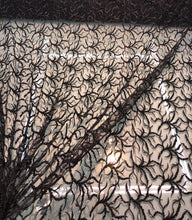 Hand beaded floral design black lace on meah fabric sold by the yard