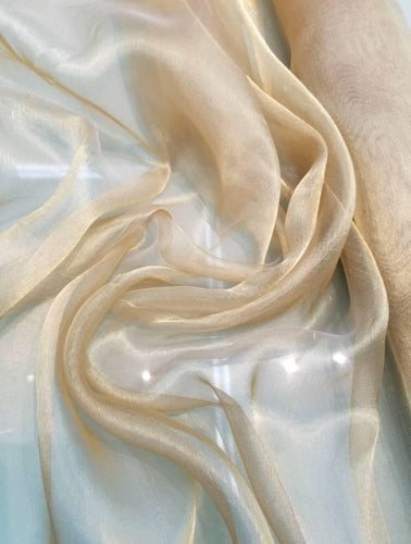Metallic  tissue organza gold color  100% Silk Organza 45" wide fabric sold by the yard. Usable for Apparel and interior designing.