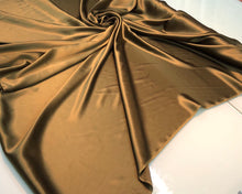 Silk charmouse 54&quot; wide    Beautiful bronze color silk charmouse fabric sold by the yard