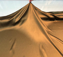 Silk charmouse 54&quot; wide    Beautiful bronze color silk charmouse fabric sold by the yard