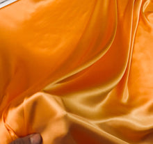 Silk charmouse 54&quot; wide    Beautiful soft  orange color silk satin charmeuse fabric sold by the yard