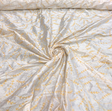 100% silk shantung hand embroidery 54&quot; wide    Beautiful white shantung/ yellow gold hand embroidered silk shantung fabric sold by the yard