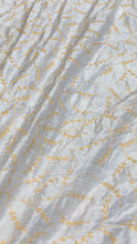 100% silk shantung hand embroidery 54&quot; wide    Beautiful white shantung/ yellow gold hand embroidered silk shantung fabric sold by the yard
