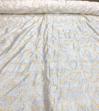 100% silk shantung hand embroidery 54&quot; wide    Beautiful white shantung/ yellow gold hand embroidered silk shantung fabric sold by the yard