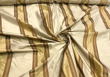 Silk taffeta stripes jaquard 54&quot; wide    Beautiful gold & mustard stripes taffeta jaquard fabric sold by the yard
