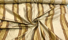 Silk taffeta stripes jaquard 54&quot; wide    Beautiful gold & mustard stripes taffeta jaquard fabric sold by the yard
