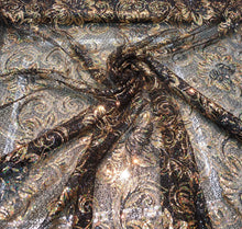 Allover floral pattern sequins 56&quot; wide   Beautiful black & gold floral pattern sequins fabric sold by the yard