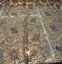Allover floral pattern sequins 56&quot; wide   Beautiful black & gold floral pattern sequins fabric sold by the yard