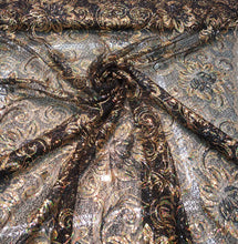 Allover floral pattern sequins 56&quot; wide   Beautiful black & gold floral pattern sequins fabric sold by the yard