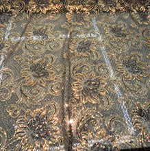 Allover floral pattern sequins 56&quot; wide   Beautiful black & gold floral pattern sequins fabric sold by the yard