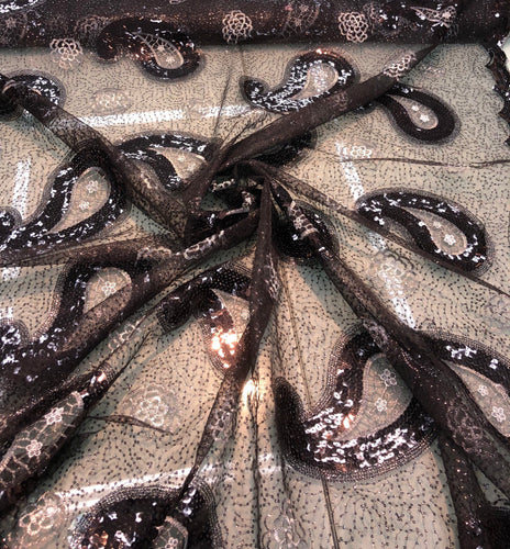 Sequins allover paisley design 54" wide   Beautiful black on black paisley design sequins on net fabric sold by the yard