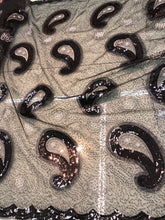 Sequins allover paisley design 54&quot; wide   Beautiful black on black paisley design sequins on net fabric sold by the yard