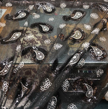 Sequins allover paisley design 54&quot; wide   Beautiful black on black paisley design sequins on net fabric sold by the yard