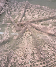 White bridal lace 52â wide.  Beautiful white bridal lace, border style white bridal lace fabric sold by the yard.