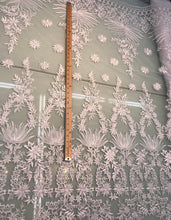 White bridal lace 52â wide.  Beautiful white bridal lace, border style white bridal lace fabric sold by the yard.