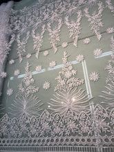 White bridal lace 52â wide.  Beautiful white bridal lace, border style white bridal lace fabric sold by the yard.